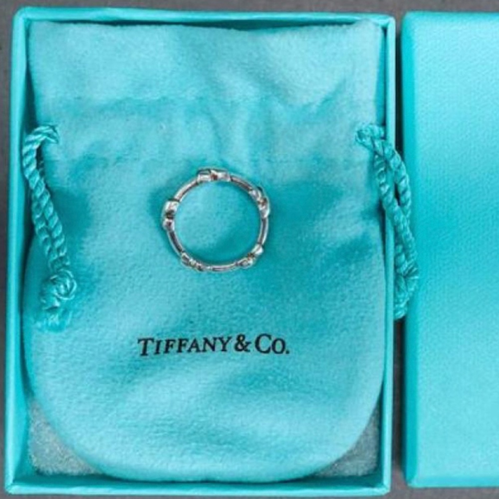 Tiffany & Co Silver Signature X Ring Band Size 4